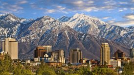 Skyline of downtown Salt Lake City with the Towering Wasatch Mountain range in the background